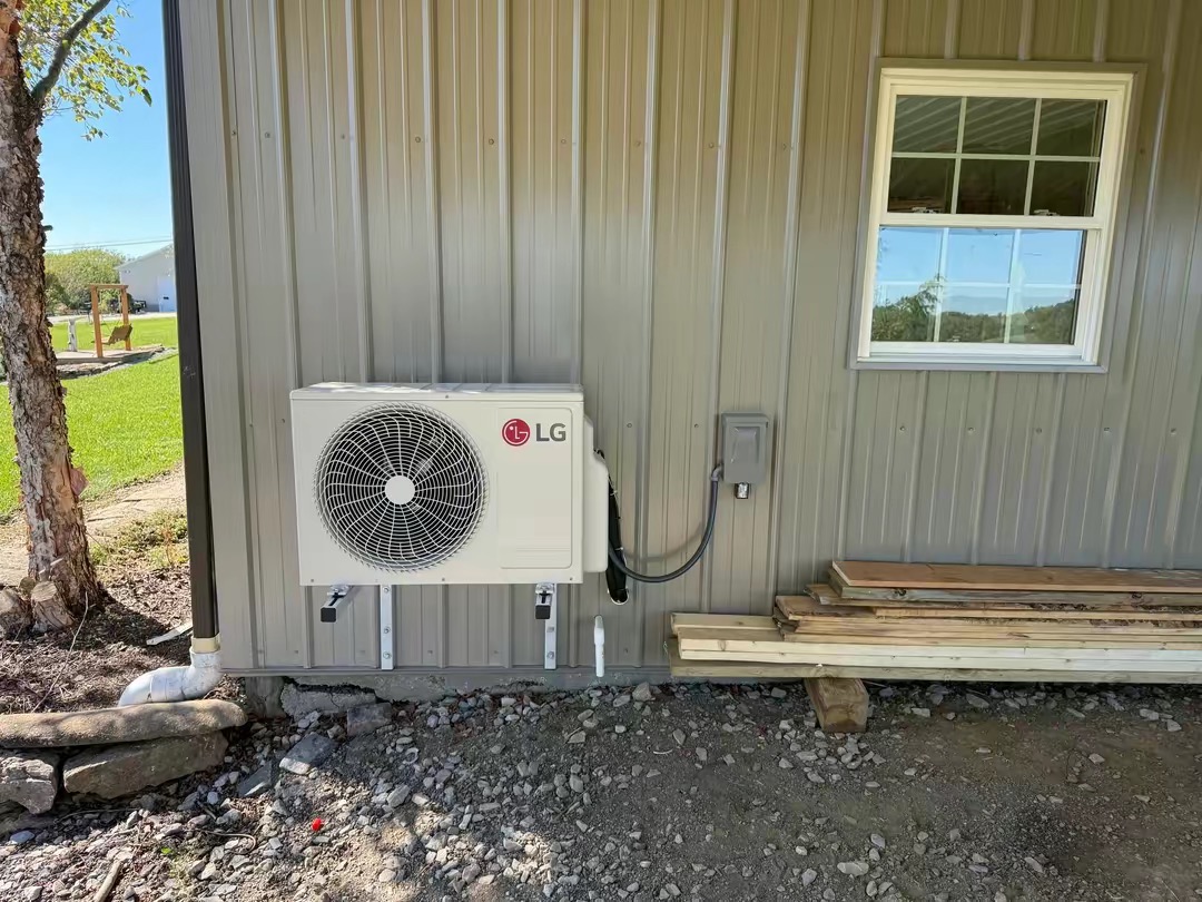 LG outdoor heat pump installed outside a Northern Kentucky building